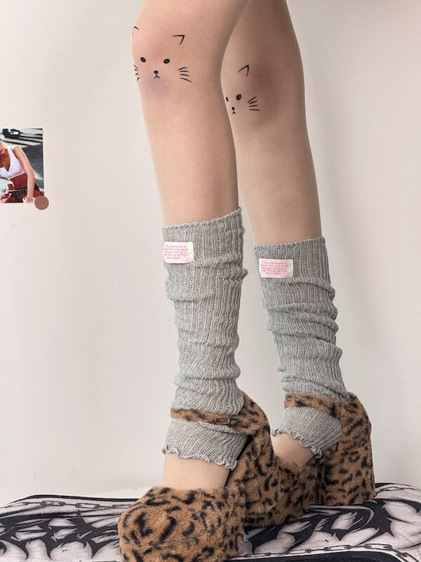 Kitty on knee tattoo tights