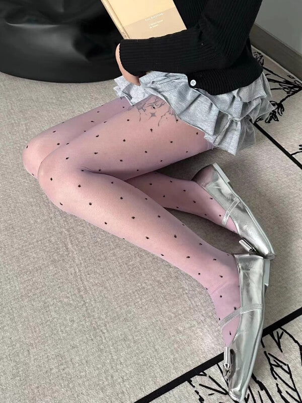Black dots in Purple