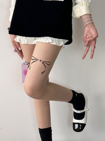 Doll bow tattoo tights