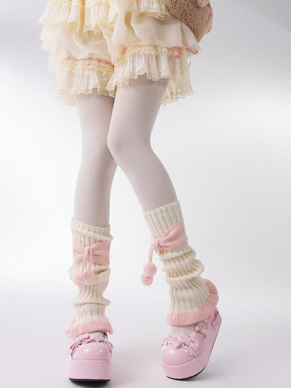 Girly bow pompon leg warmers