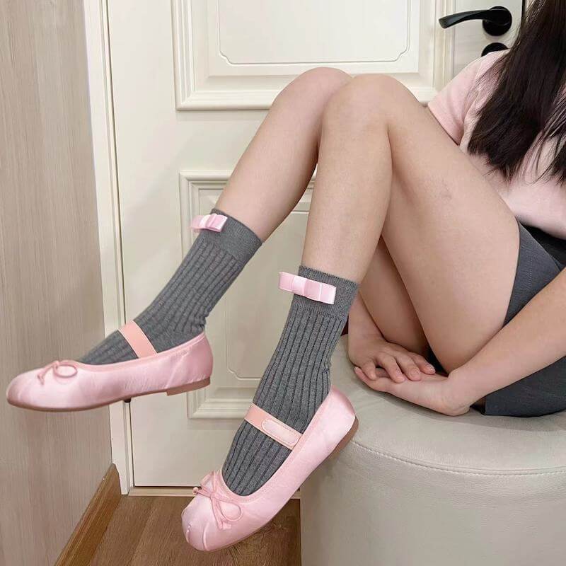 Light grey with pink bow