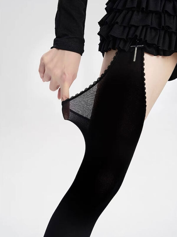 Thigh-high ripped tights with faux suspenders
