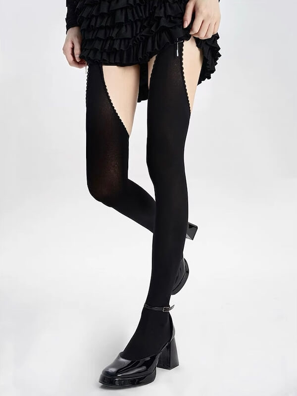 Thigh-high ripped tights with faux suspenders