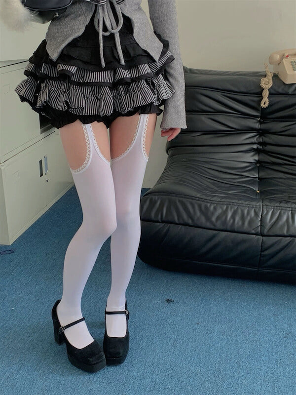 Thigh-high ripped suspender stockings tights