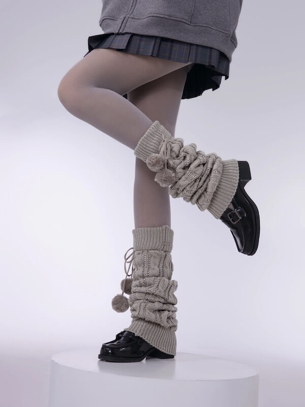 Pompon twisted over knee leg warmers