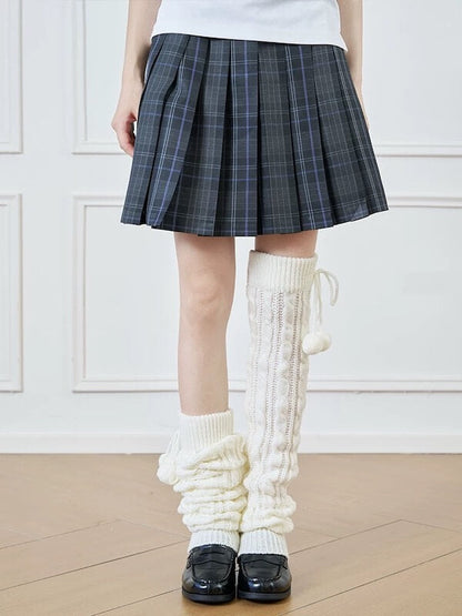 Pompon twisted over knee leg warmers
